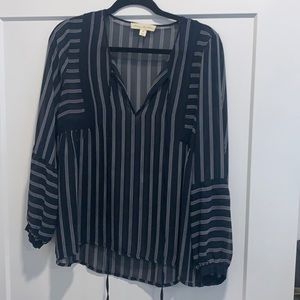 Blue sheer v neck top with white strips